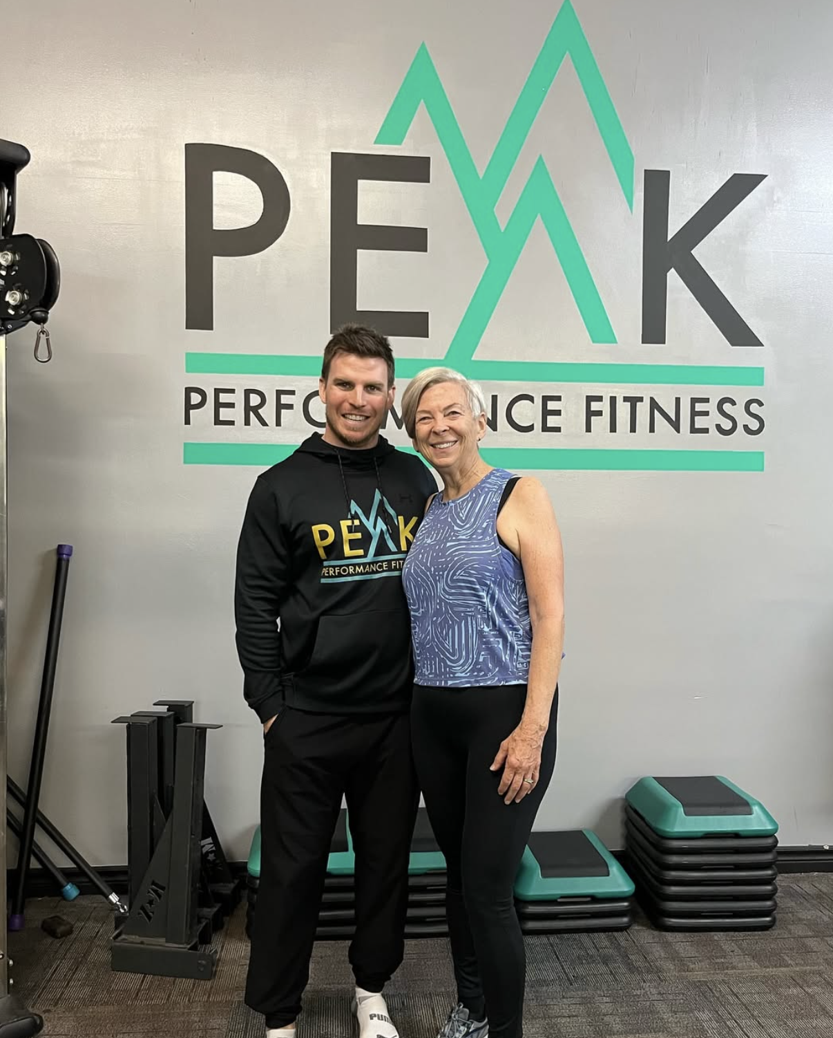 Brandon with a longtime member of the gym